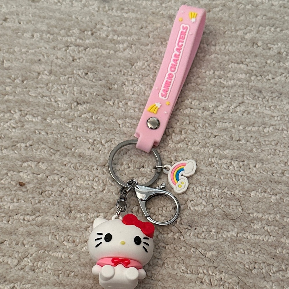 Sanrio Hello Kitty Pink Keychain with Red Bow
